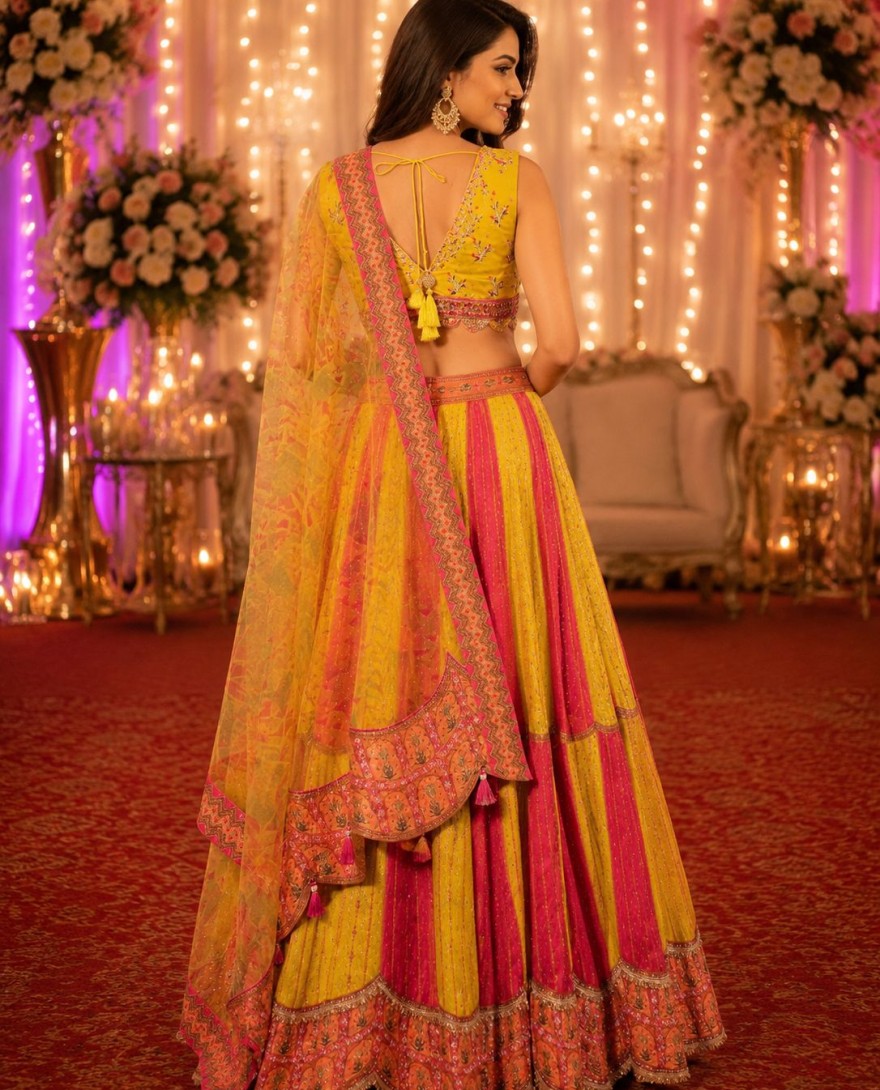 1214 - Embroidered Work Tissue Lehenga Choli In Pink and Yellow Colour
